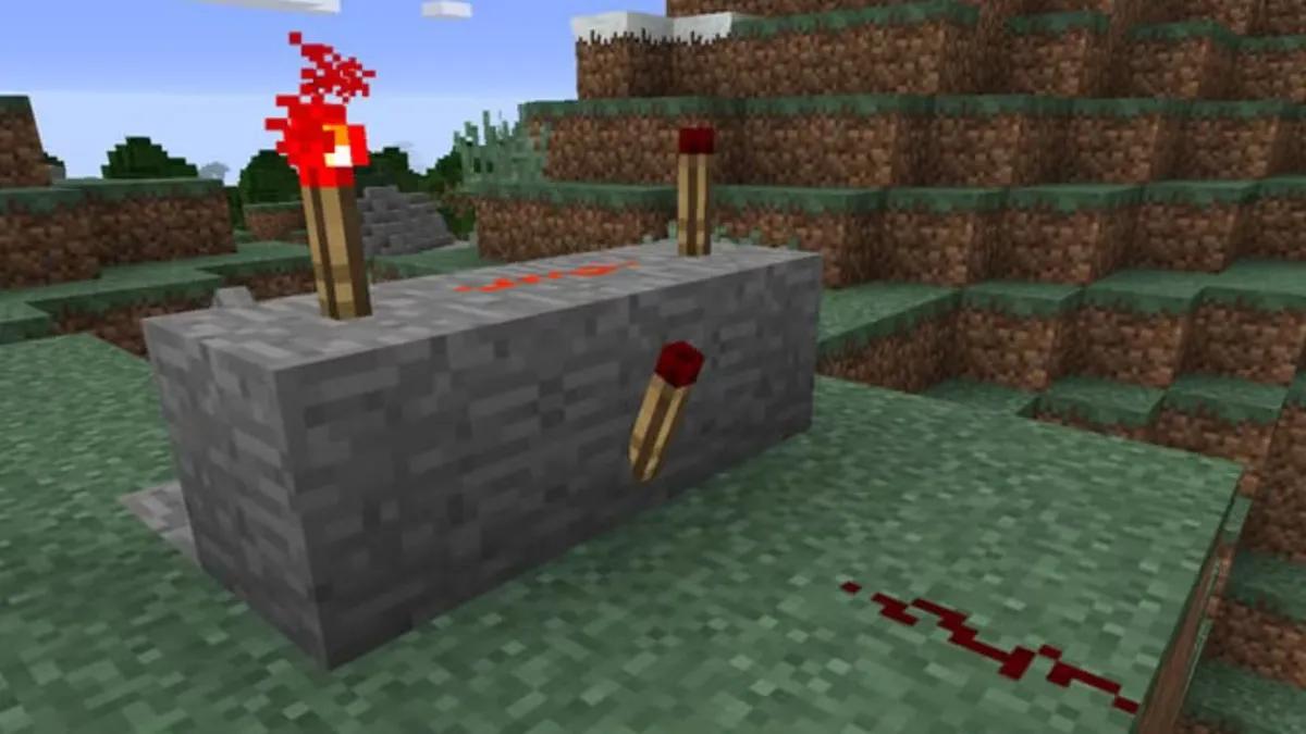 Un joueur ajoute une pierre rouge fonctionnelle à l'émulateur Minecraft fonctionnant dans le jeu